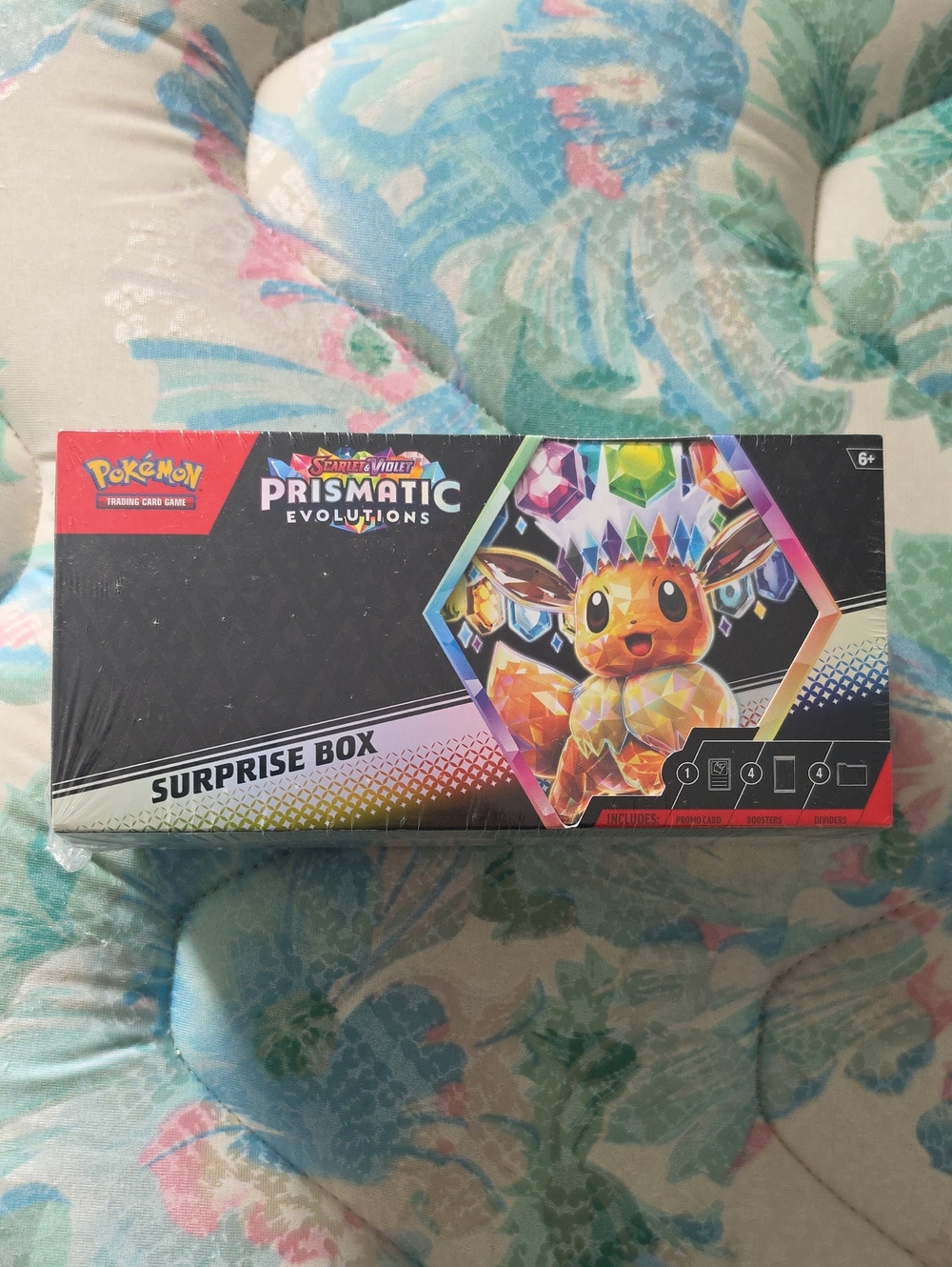 Pokemon Prismatic Evolutions Surprise Box - Black, Rainbow, Yellow